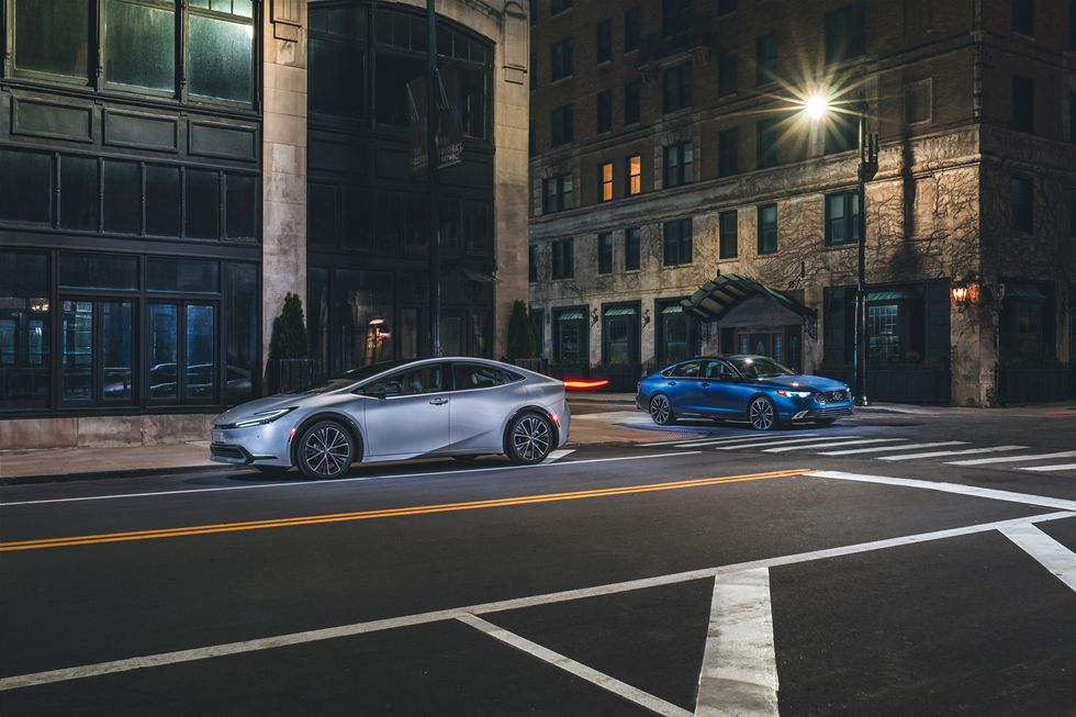 View Photos of the 2023 Honda Accord Touring vs. 2023 Toyota Prius Limited