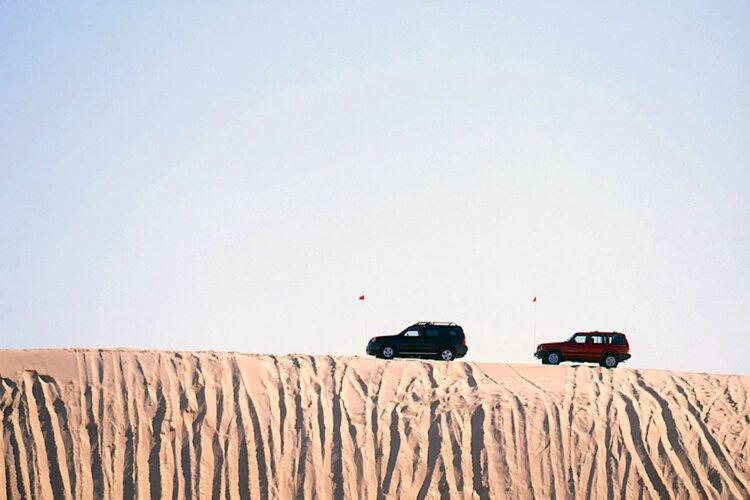 View Photos of the 1999 Nissan Xterra vs. Jeep Cherokee Sport