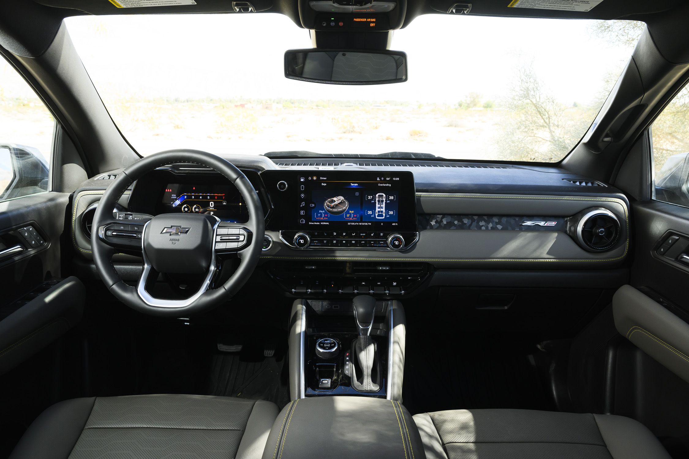 View Interior Photos of the 2025 Chevrolet Colorado ZR2 Bison, 2024 Ford Ranger Raptor, and 2024 Toyota Tacoma TRD Pro