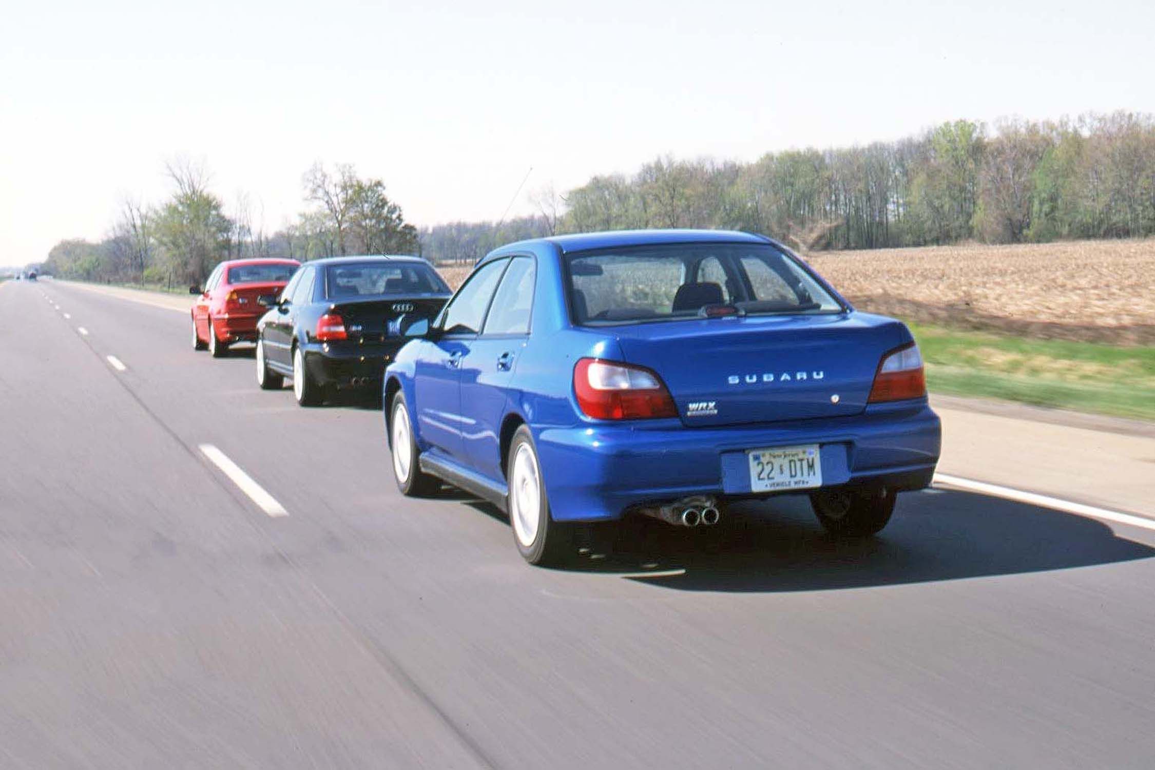Unfair Fight? 2002 Subaru Impreza WRX vs. Audi S4 Quattro and BMW 330xi