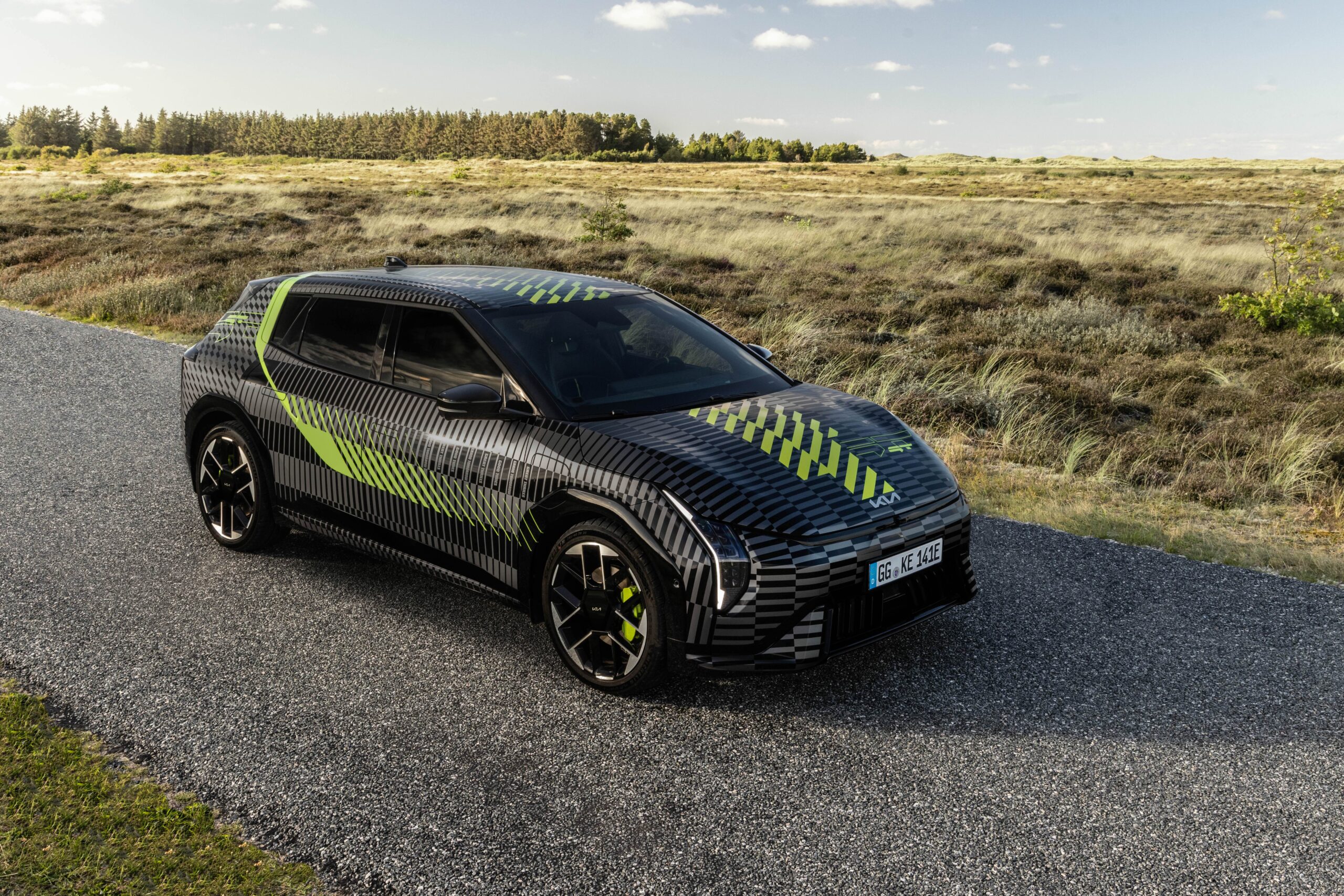 Kia Prepares for 2026 EV4 GT Launch with a Neon-Wrapped EV Hatch